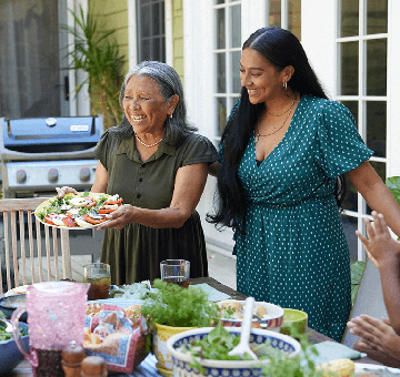 Lola, a patient living with early Alzheimer's, and her daughter, Nadine