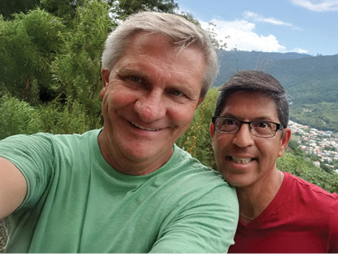 Leonard and his partner, Mark, in the mountains