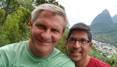 Leonard, a patient living with early Alzheimer's, and his partner, Mark, in the mountains