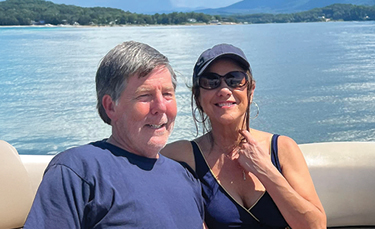 Rachel and her husband, Doug, smiling