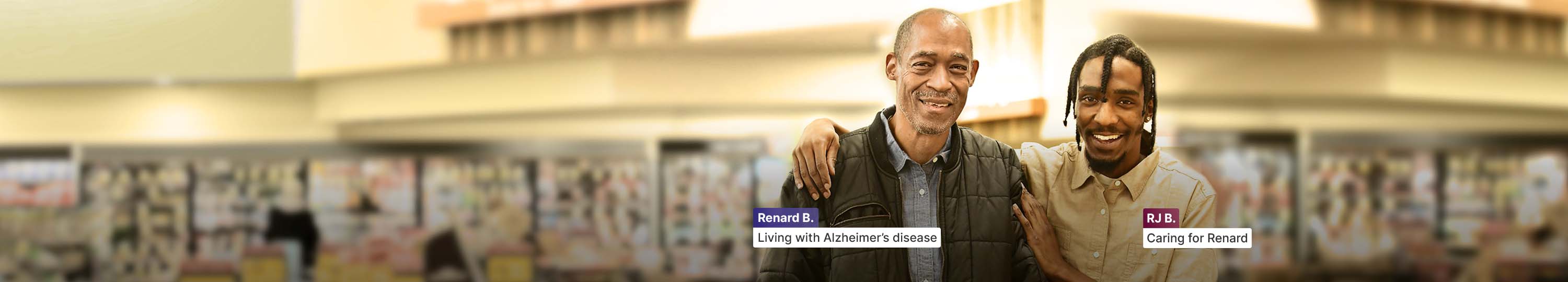 Renard, who is living with Alzheimer’s disease, arm in arm with RJ, his care partner, in a supermarket