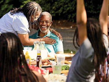Bob surrounded by his family