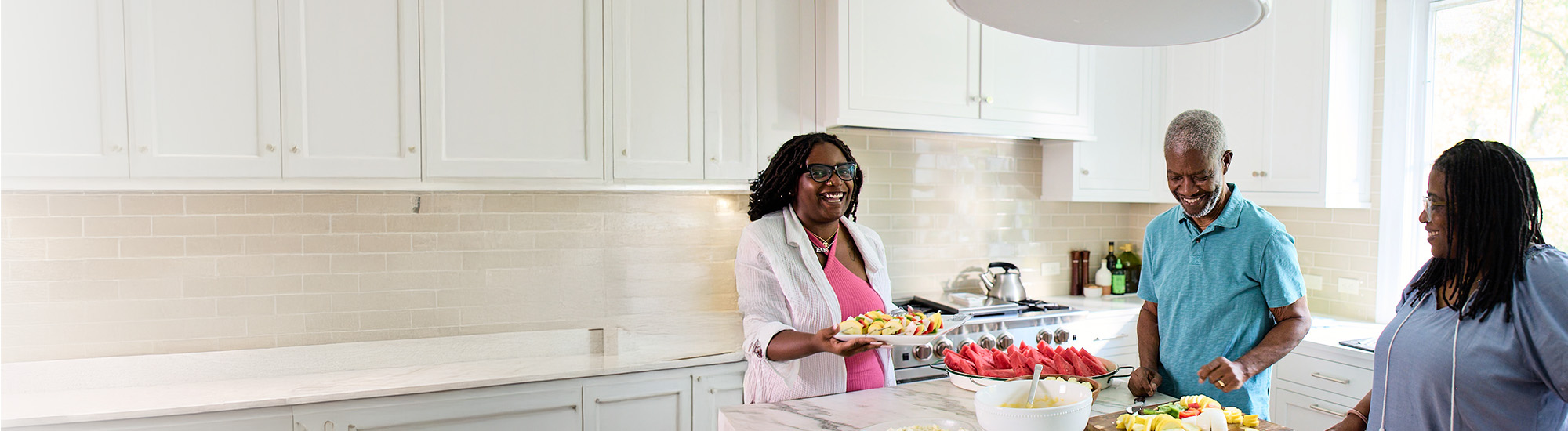Bob and his wife, Cynthia, in the kitchen, smiling