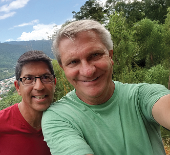Leonard and his partner, Mark, in the mountains